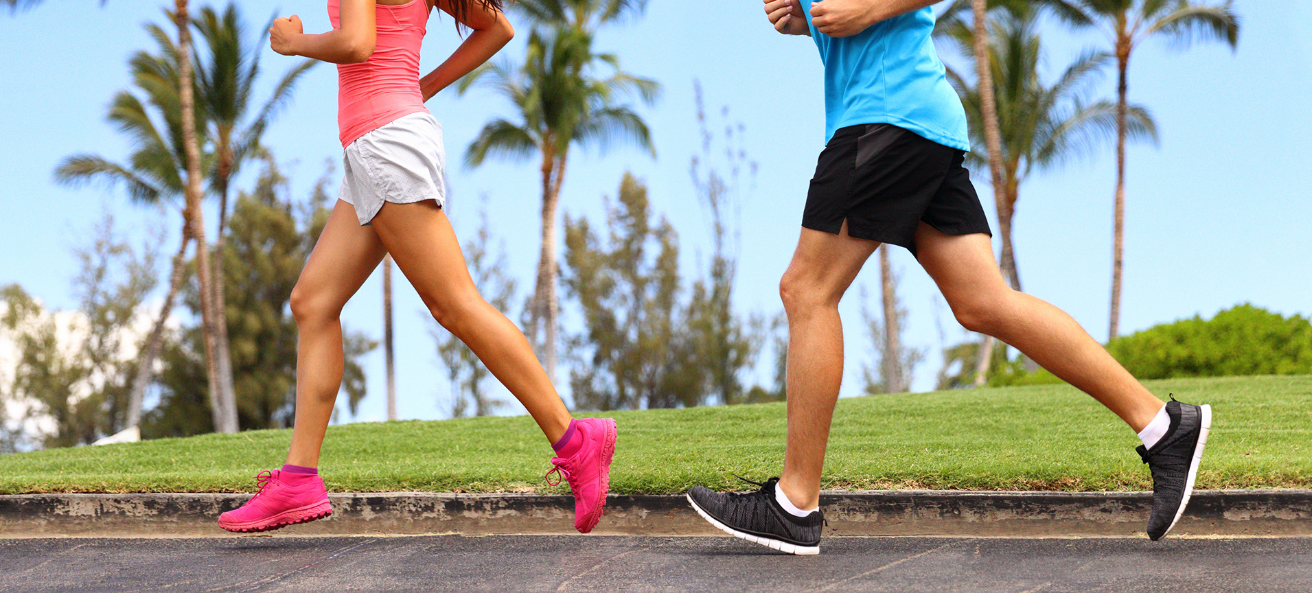 Two people are jogging on a path